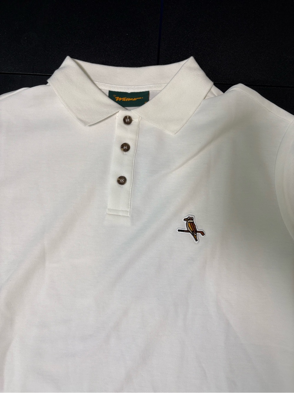 Men's White Short-Sleeve Polo with Small Embroidered Motif - Picture 2 of 9